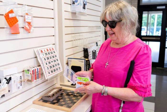 woman shopping for assistive aids at East Texas Lighthouse Low Vision Store