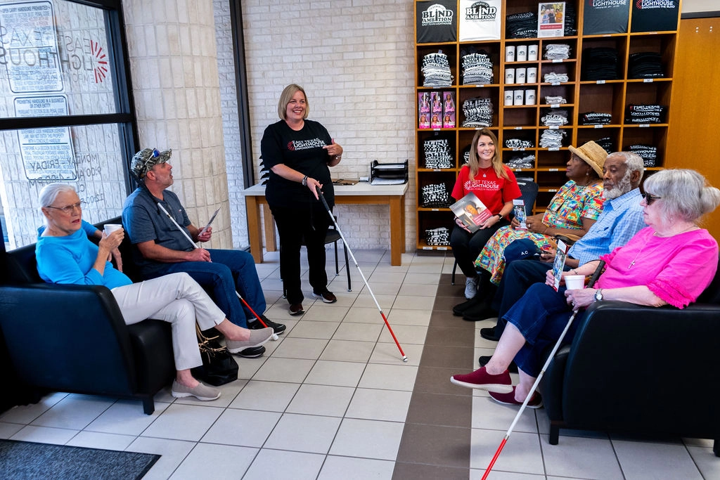 Peer Support Group meeting with several blind and visually impaired adults
